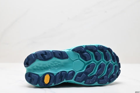 New Balance MTMORLY3 running shoes, platform sole for added height, breathable and cushioned.