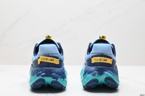 New Balance MTMORLY3 running shoes, platform sole for added height, breathable and cushioned.