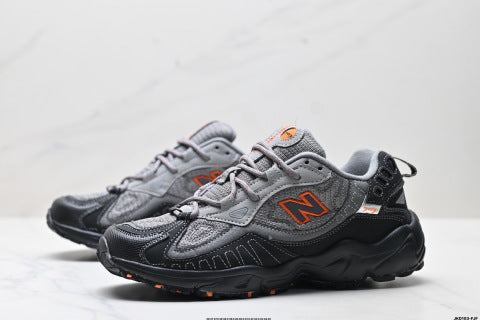 New Balance NB 703 series running shoes, shock-absorbing, wear-resistant, outdoor sports performance shoes.