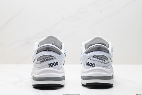 New Balance 1000 series running shoes, low-top, dad style, casual sportswear.