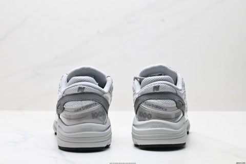 New Balance 1000 series running shoes, low-top, retro dad style, casual sportswear.