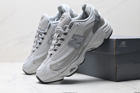 New Balance 1000 series running shoes, low-top, retro dad style, casual sportswear.