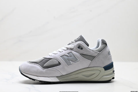 New Balance NB 990 series running shoes, athletic shoes, breathable mesh cushioning, casual wear.