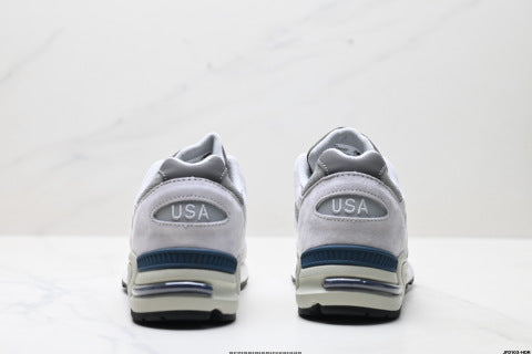 New Balance NB 990 series running shoes, athletic shoes, breathable mesh cushioning, casual wear.