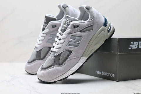 New Balance NB 990 series running shoes, athletic shoes, breathable mesh cushioning, casual wear.