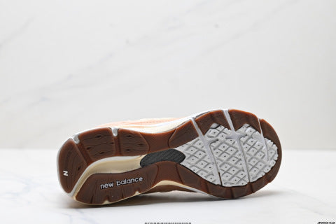 New Balance NB 990 series athletic shoes, breathable mesh, low-top, casual running shoes.
