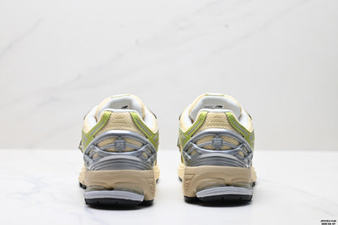 New Balance M1906 series athletic shoes, men's and women's shoes, breathable and lightweight, chunky sneaker style.