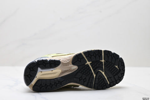 New Balance M1906 series athletic shoes, men's and women's shoes, breathable and lightweight, chunky sneaker style.