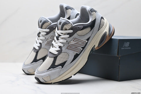 New Balance 2010 series athletic shoes, chunky style, breathable mesh fabric, suitable for running and casual wear.