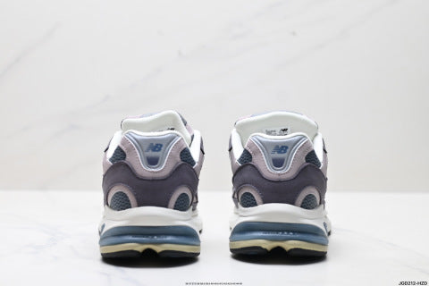 New Balance 2010 series running shoes, chunky style, breathable mesh, casual.