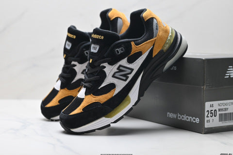 New Balance 992 series running shoes: classic retro style, versatile for casual and athletic wear.