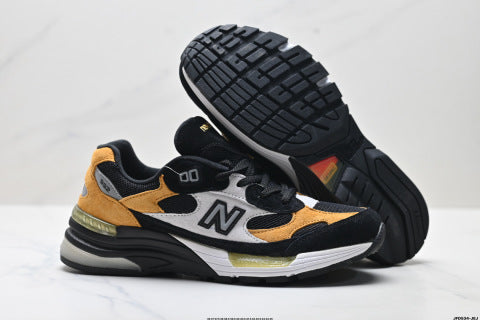 New Balance 992 series running shoes: classic retro style, versatile for casual and athletic wear.
