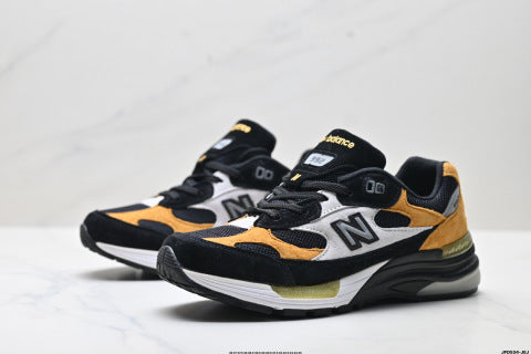 New Balance 992 series running shoes: classic retro style, versatile for casual and athletic wear.