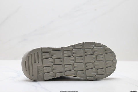New Balance 5740 series athletic shoes, low-top cushioned running shoes