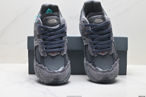 New Balance 2002R athletic shoes: comfortable, slip-resistant, durable, and suitable for casual wear.