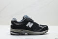 New Balance 2002R athletic shoes, men's and women's, breathable and cushioned, outdoor style.